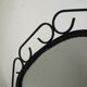 Rearview mirror with black metal frame, 1950