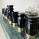 Acrylic & gilt brass chess set with marble board, Italy, 1970s