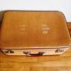 Old suitcase yellow orange