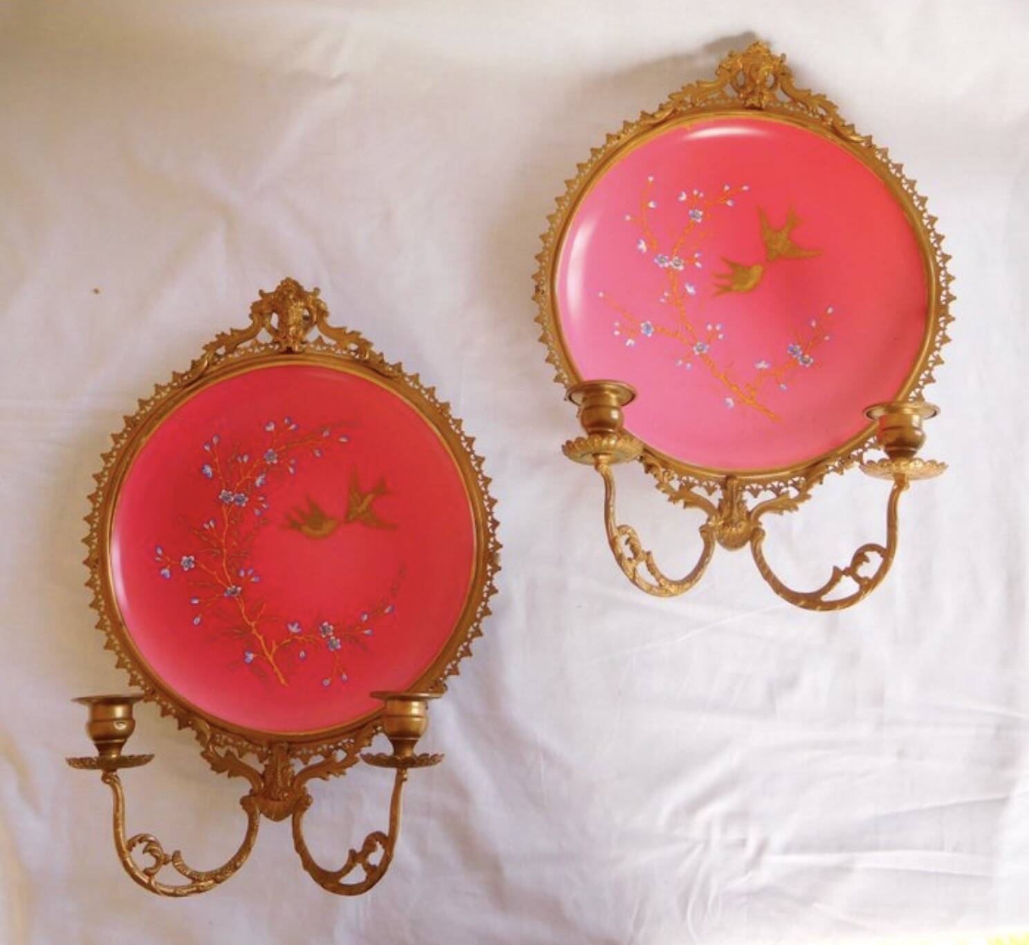 Pair of Napoleon III porcelain and bronze wall lights