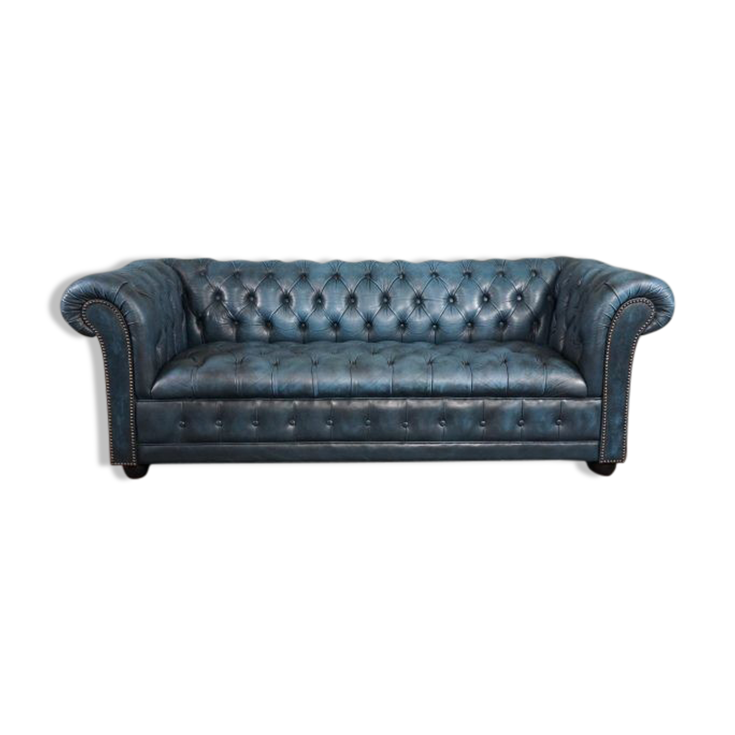 Chesterfield sofa buttoned in blue cowhide, 2.5 seats