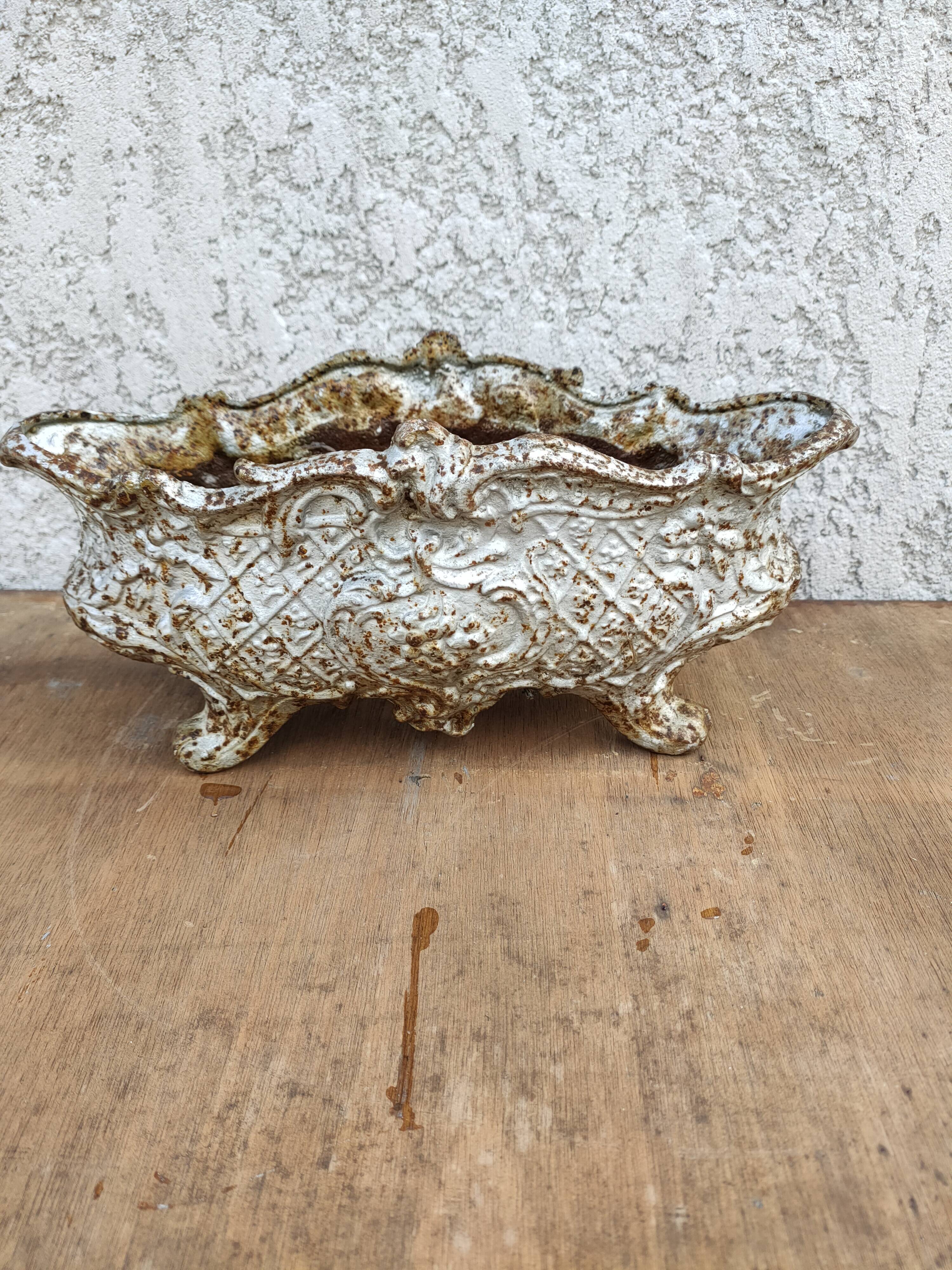 old cast iron planter