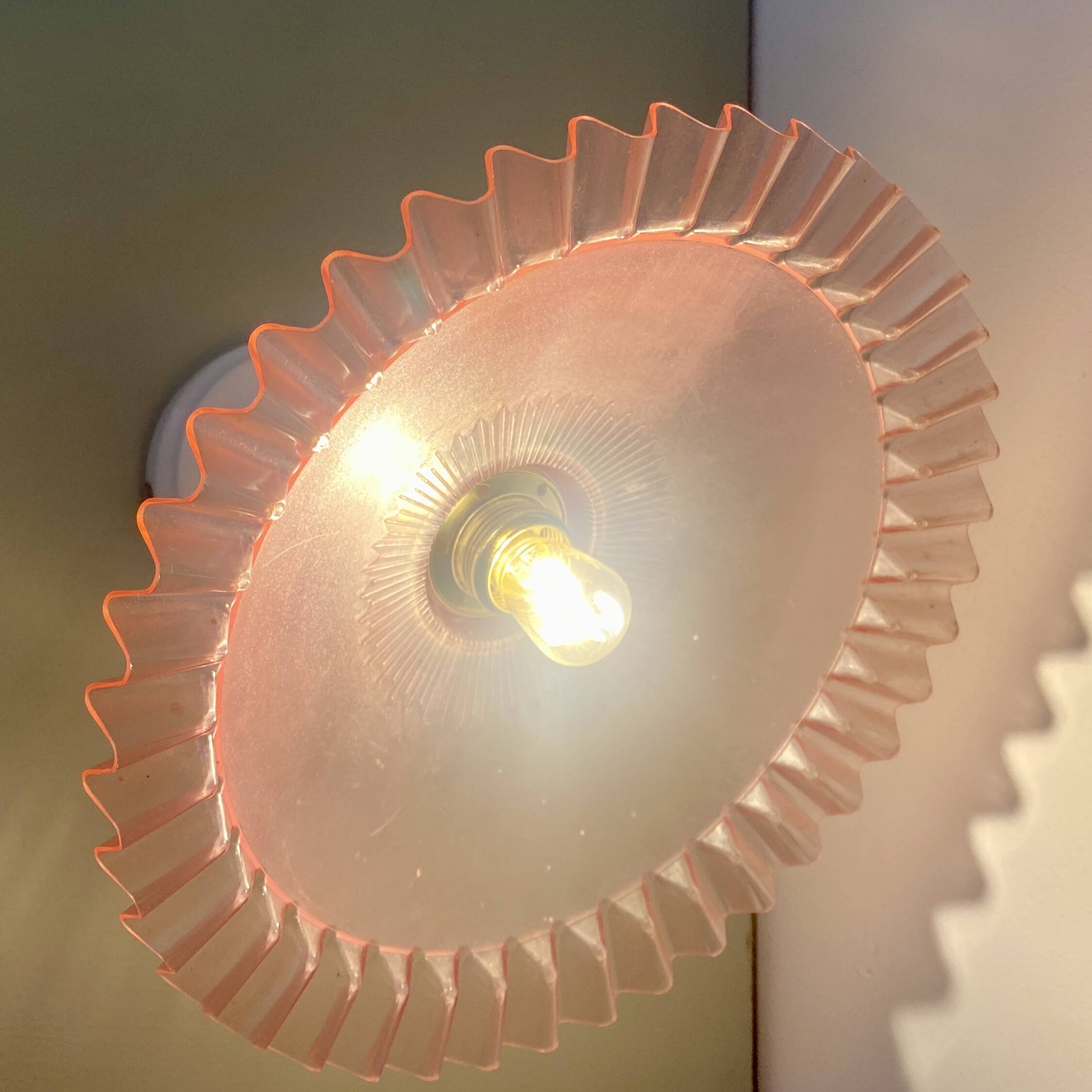 Vintage pink plastic lampshade wall light