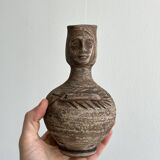 Decorative vase in raw terracotta