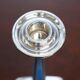 Pair of sterling silver and enamel candlesticks 1927 by Charles Green & Co.