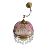 Antique pink glass pendant light with tassels.