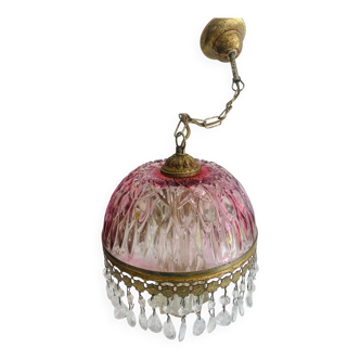 Antique pink glass pendant light with tassels.