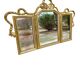 Miroir triptyque en bois doré et sculpté