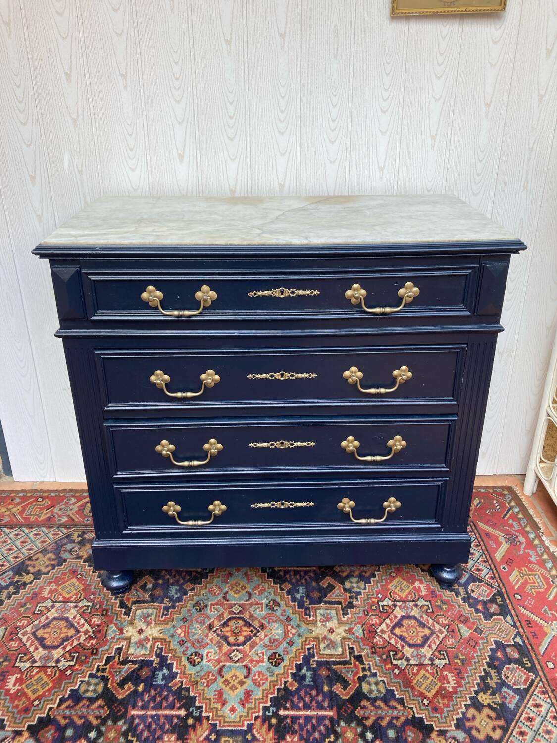 Chest of drawers with marble
