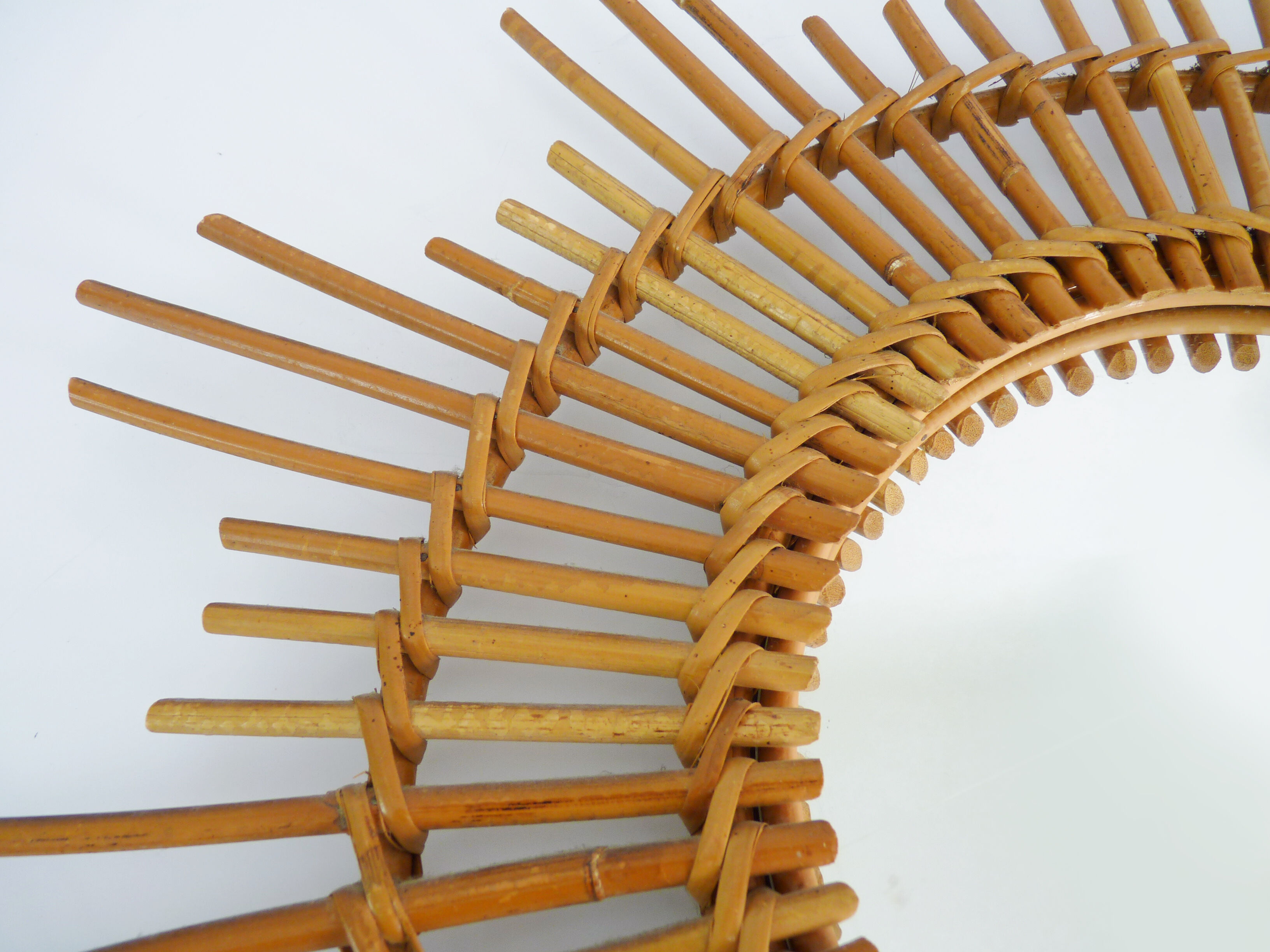 Vintage rattan sun mirror. Year 60