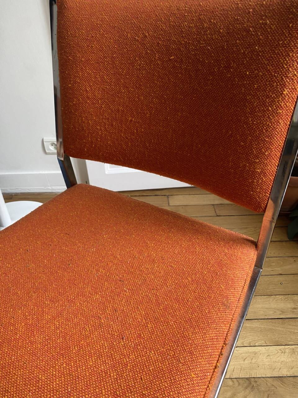 Orange office chair in 70s style