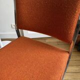 Orange office chair in 70s style