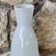 White glass vase