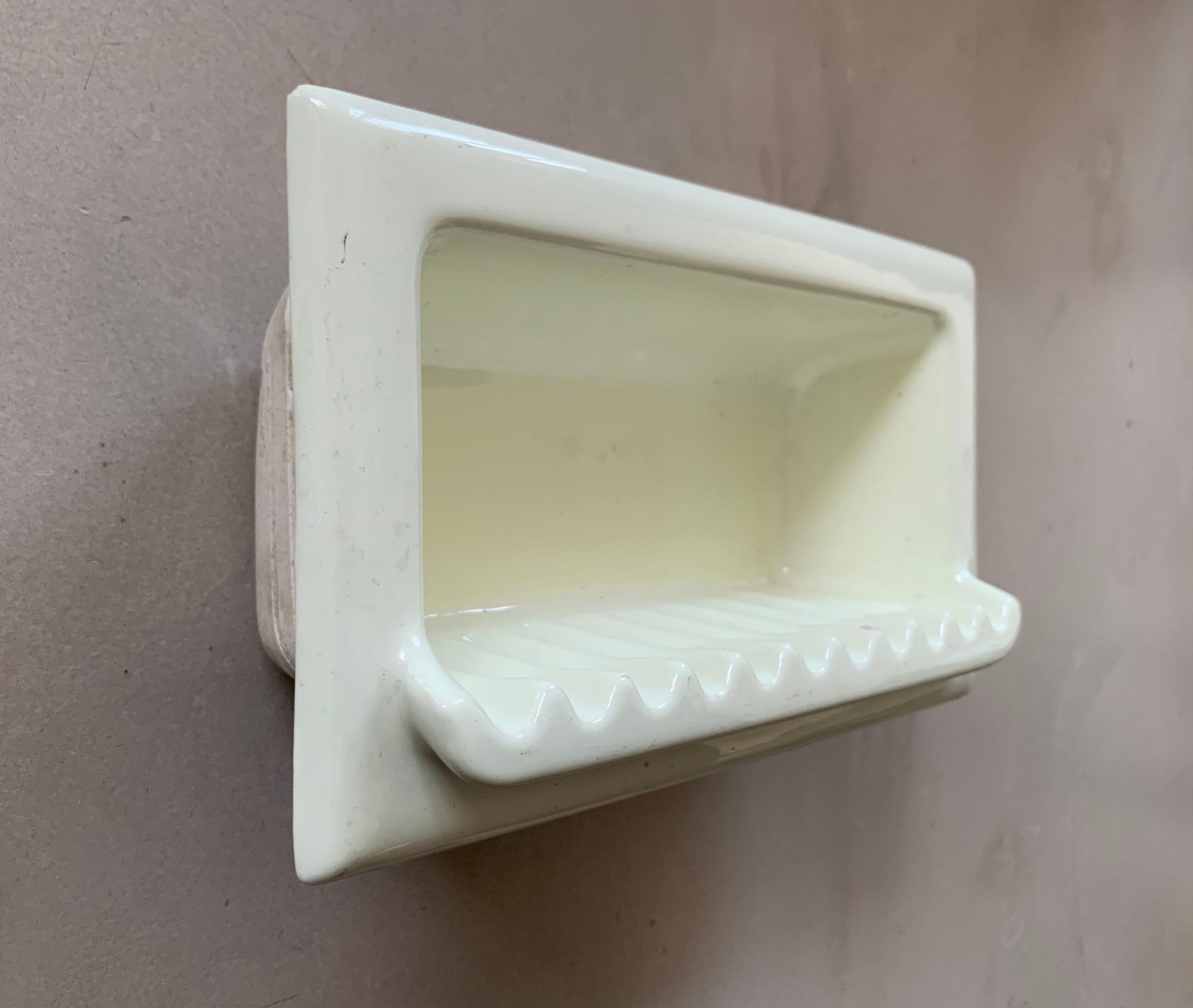 Wall mounted soap holder