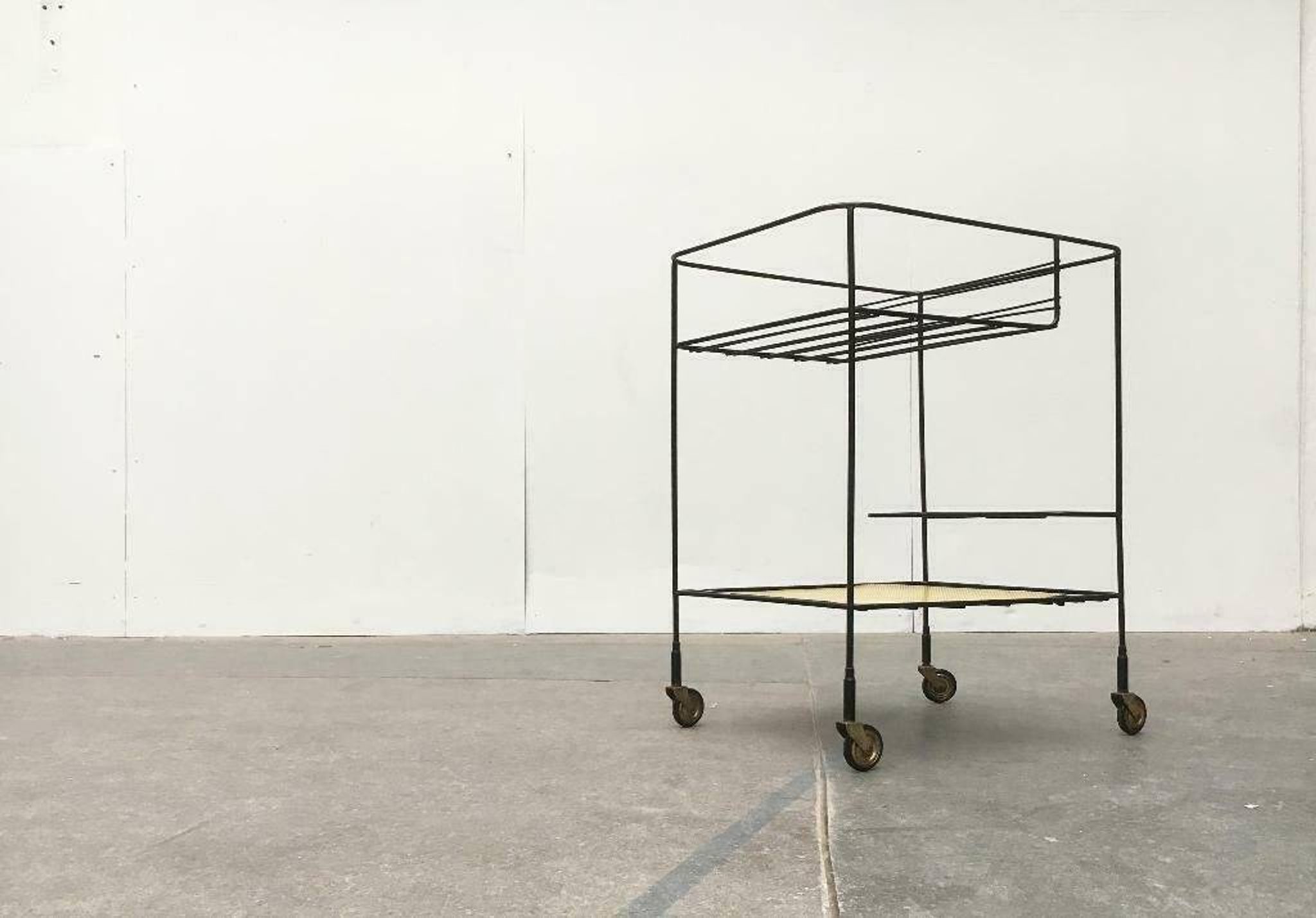 Minimalist perforated metal serving trolley in mid-century style, 1960s.