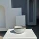 Small white glazed ceramic bowl black edges
