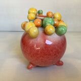 Small tripod vase with multicolored marbles