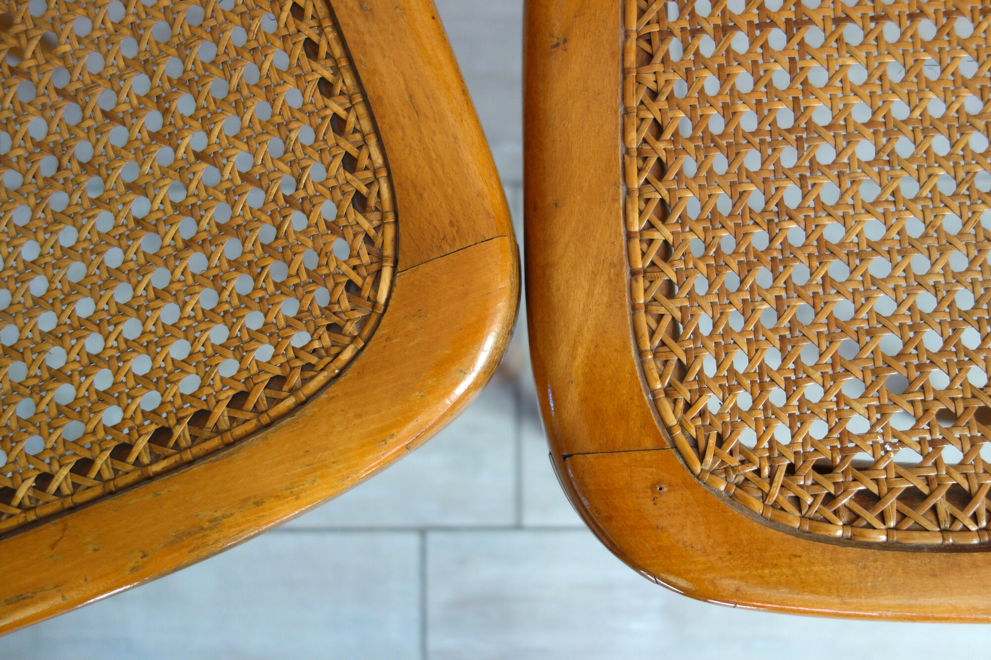 Pair of stella caned bistro chairs, 1930s