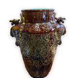 Important Longchamp Griffon vase in golden ceramic