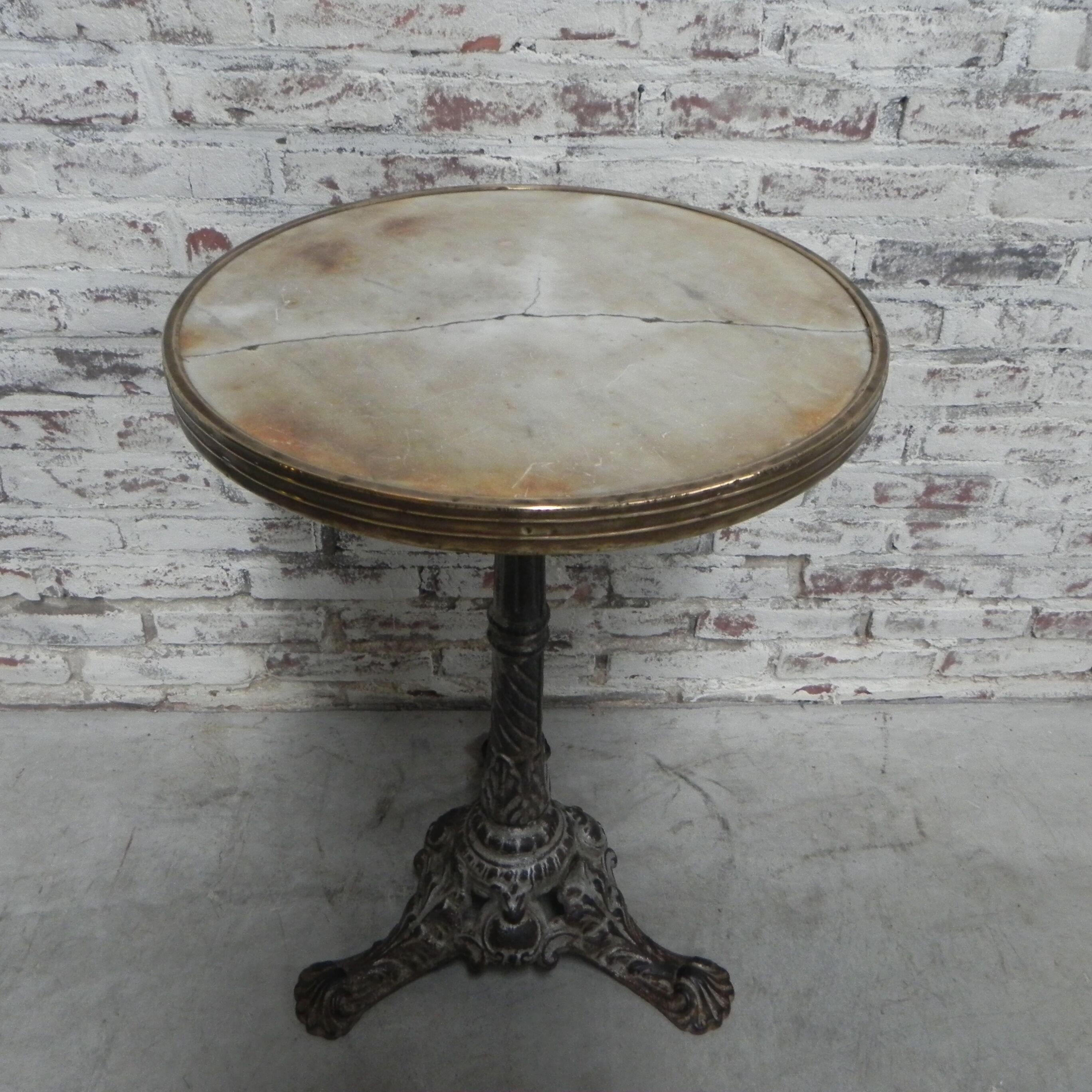 Bistro table with cast iron leg