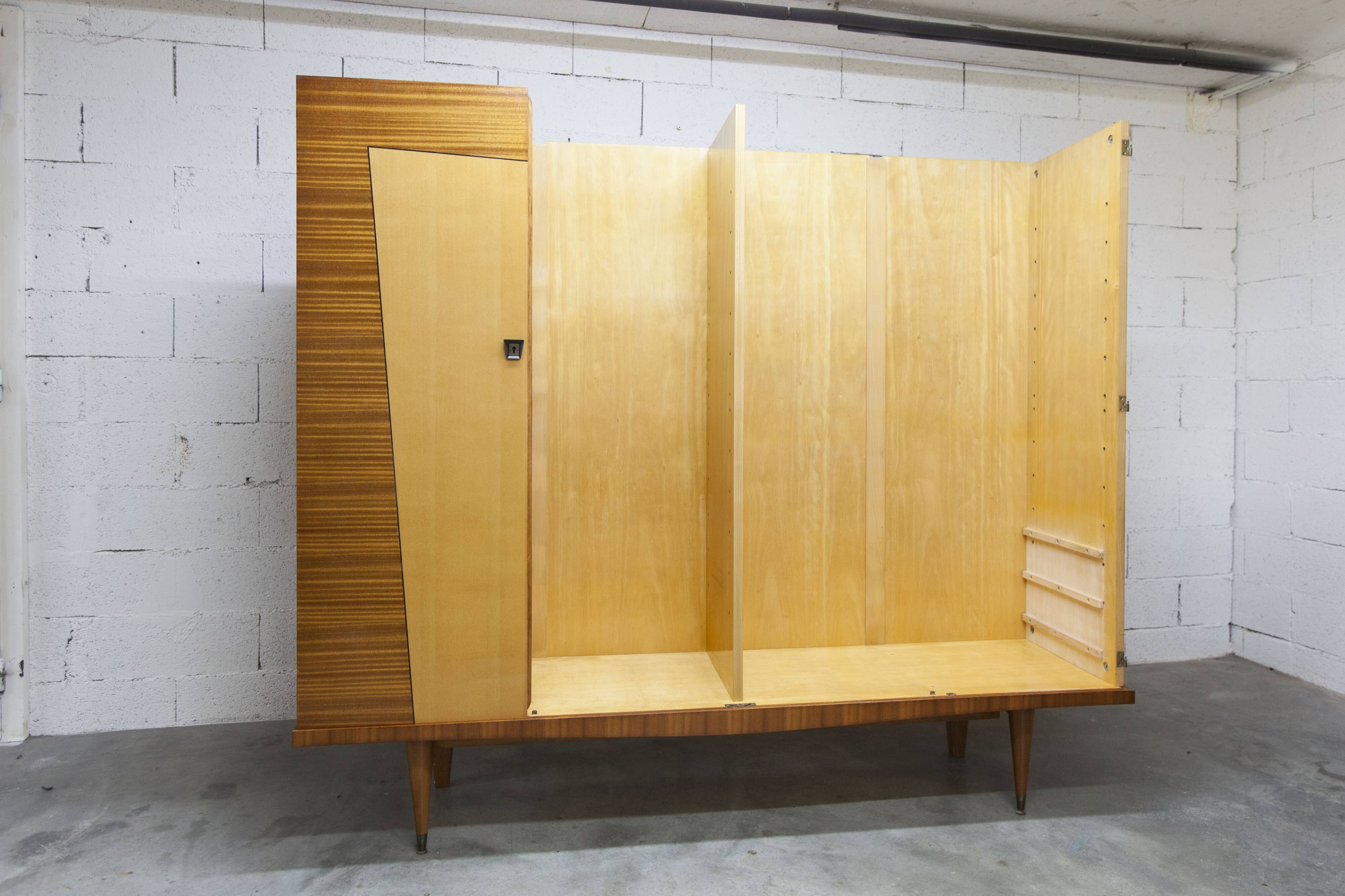 1960s Scandinavian wardrobe, blonde varnished wood, unusual, 4 doors, 3 drawers, 7 shelves.