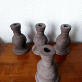 Four vintage handcrafted candle holders