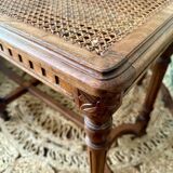 Piano bench seat in cane