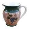 Old wine pitcher in glazed ceramic, grape cluster pattern