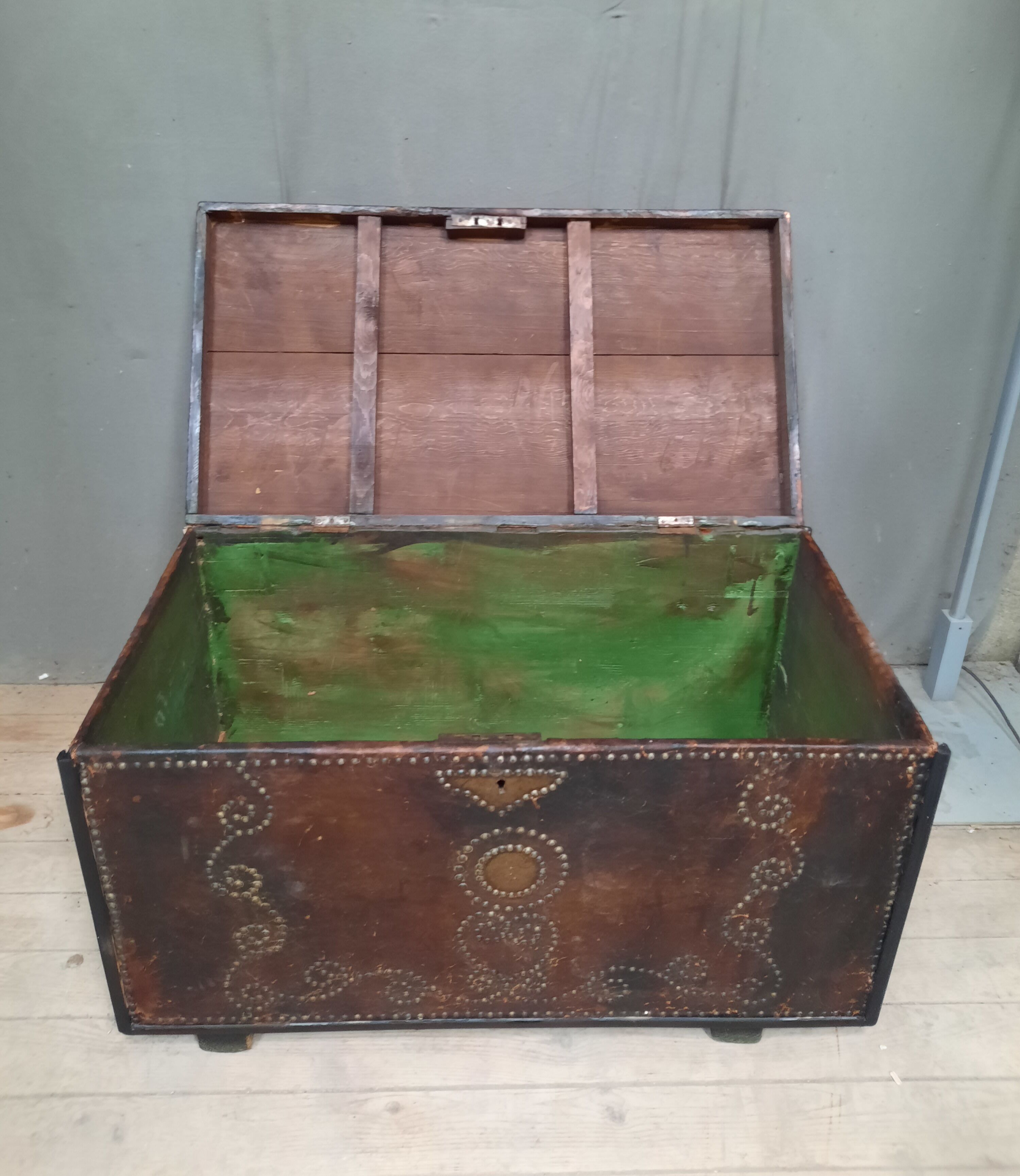 Chest covered with leather and nails