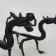 Paire de chenets de cheminée aux dragons en fer forgé