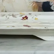 Very large rectangular dish with scalloped edges, made of fine glazed earthenware.