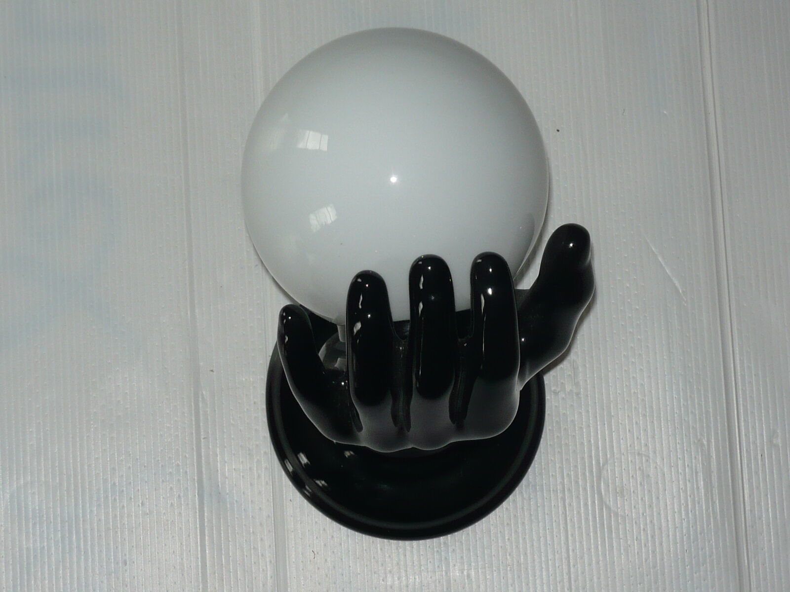 Ceramic hand wall lamp