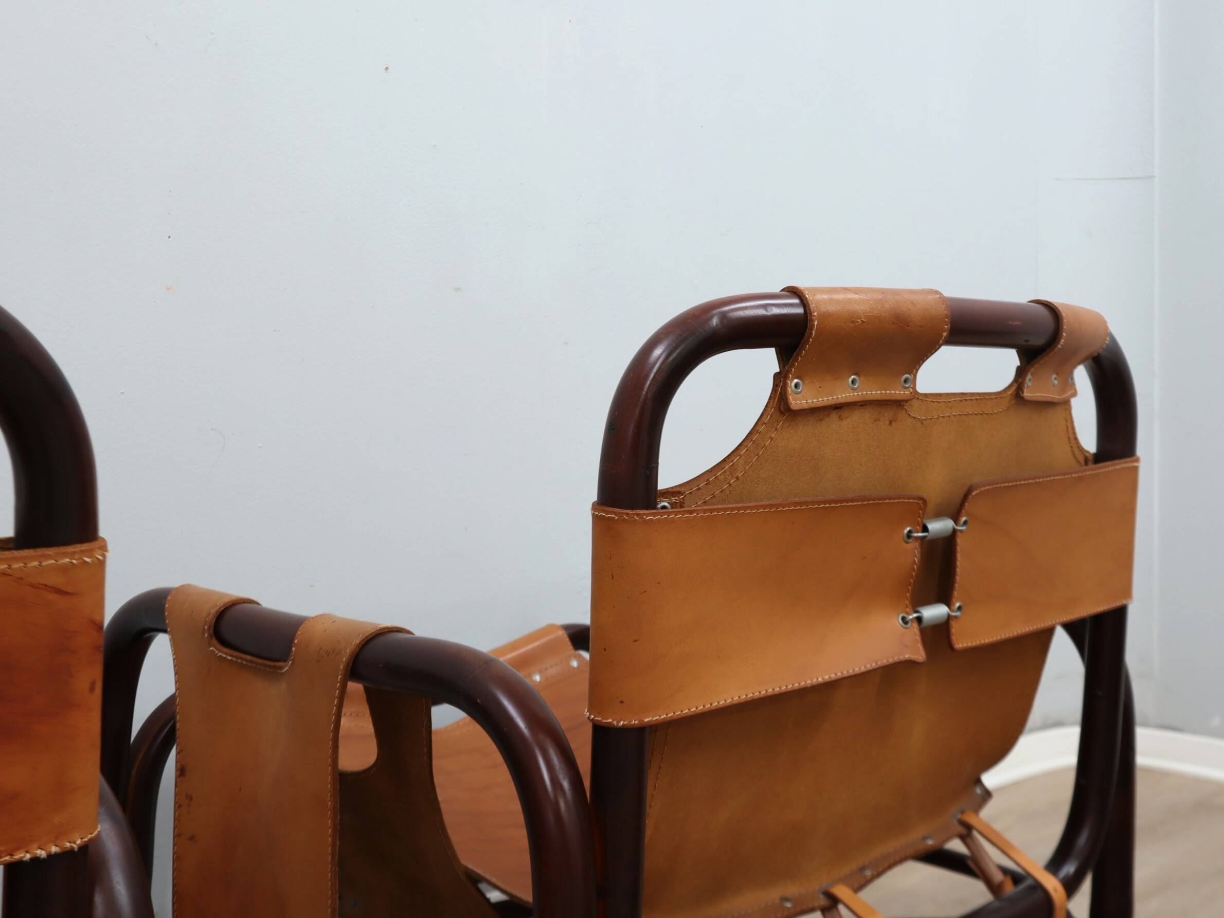 A vintage Tito Agnoli armchair leather and bamboo 1960s