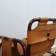 A vintage Tito Agnoli armchair leather and bamboo 1960s