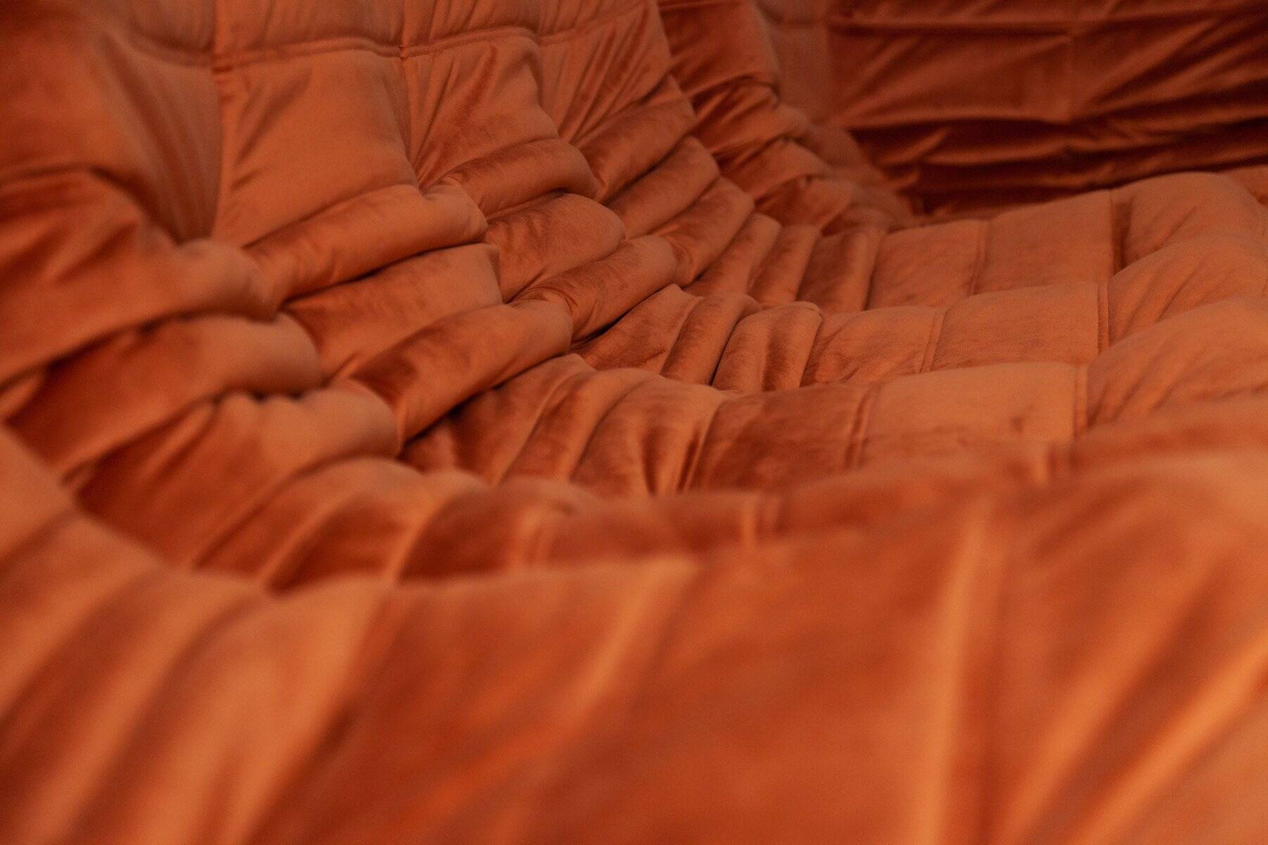 Togo two-seater sofa in amber orange velvet by Michel Ducaroy for Ligne Roset, 1973