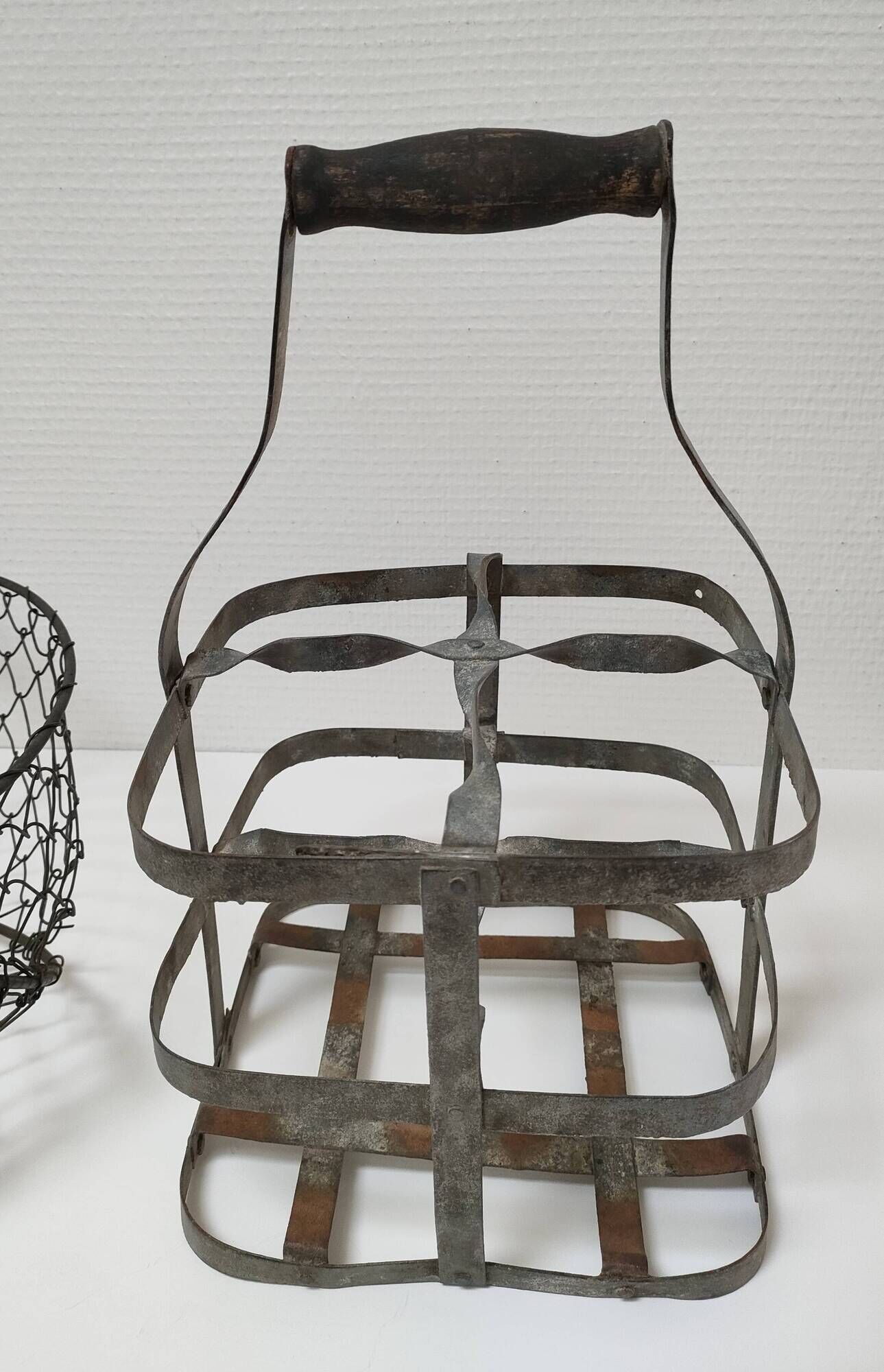Two baskets metal and patinated wood early twentieth century