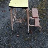 Yellow formica stool stepladder step