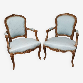 Reupholstered Louis XV convertible armchairs