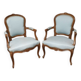 Reupholstered Louis XV convertible armchairs
