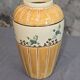 Orange and green ceramic vase with duck motif
