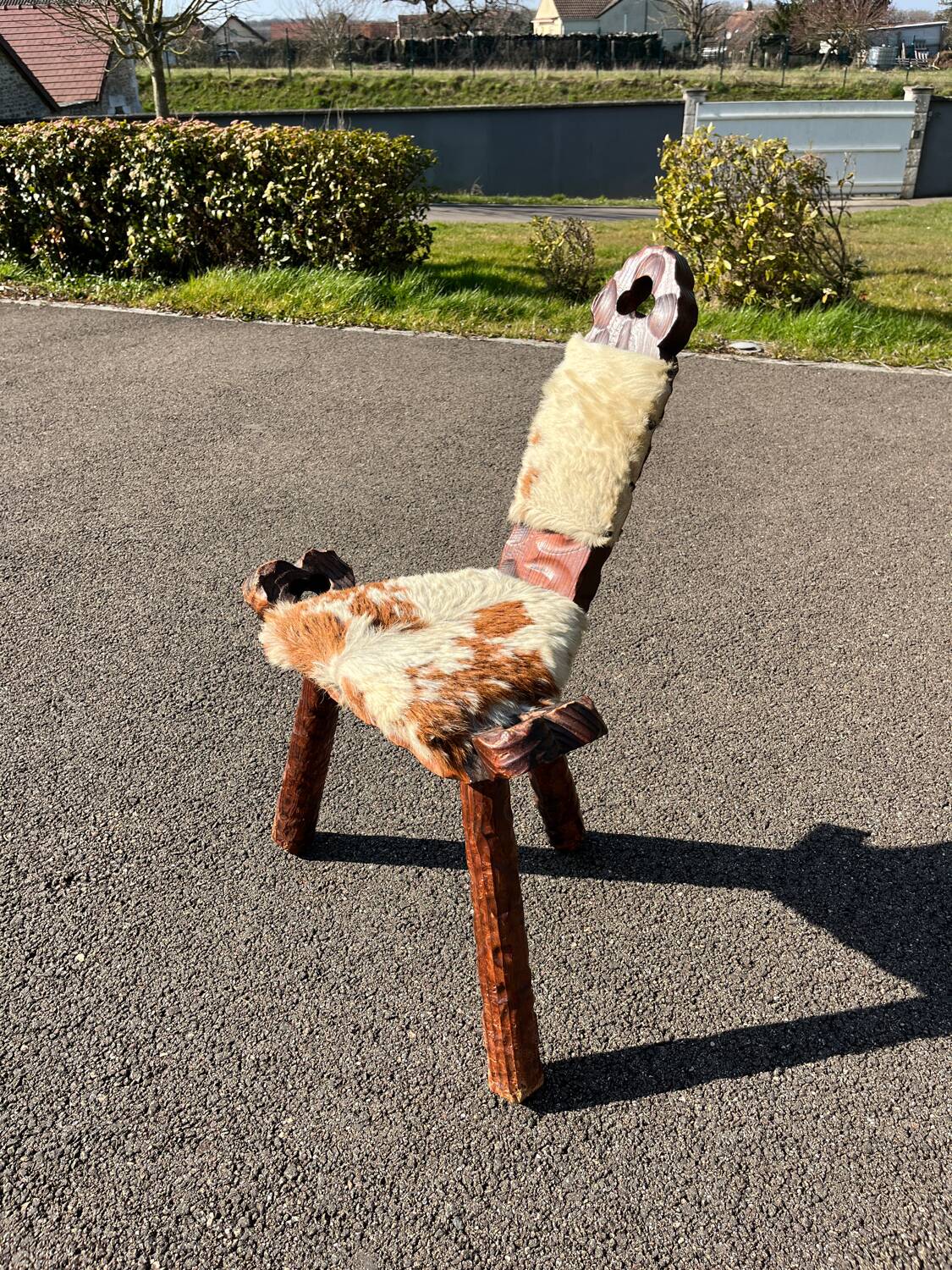 Vintage brutalist tripod chair in wood and leather