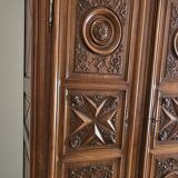 Carved cherubs cabinet