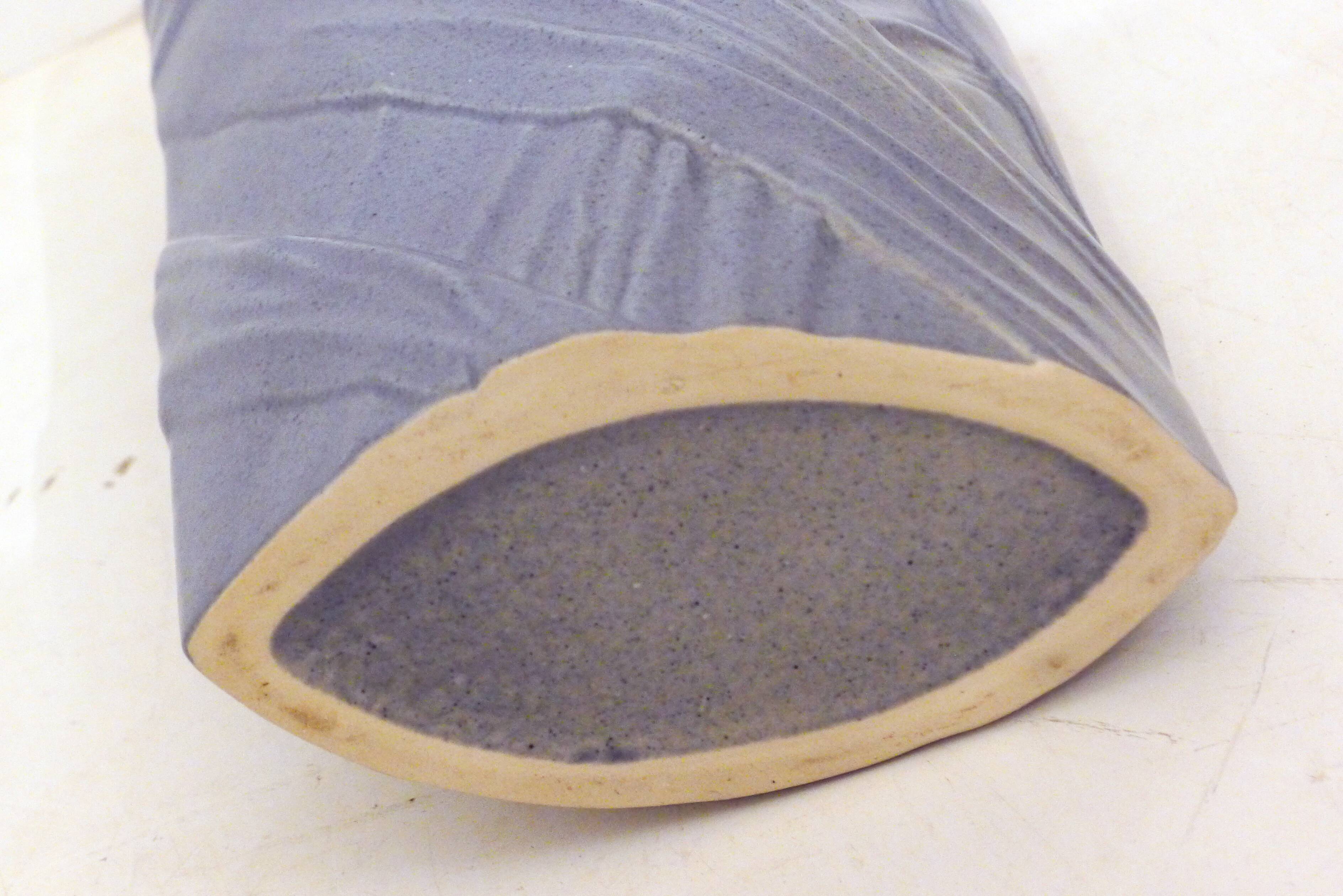 Purple vase, draped ribbons in relief