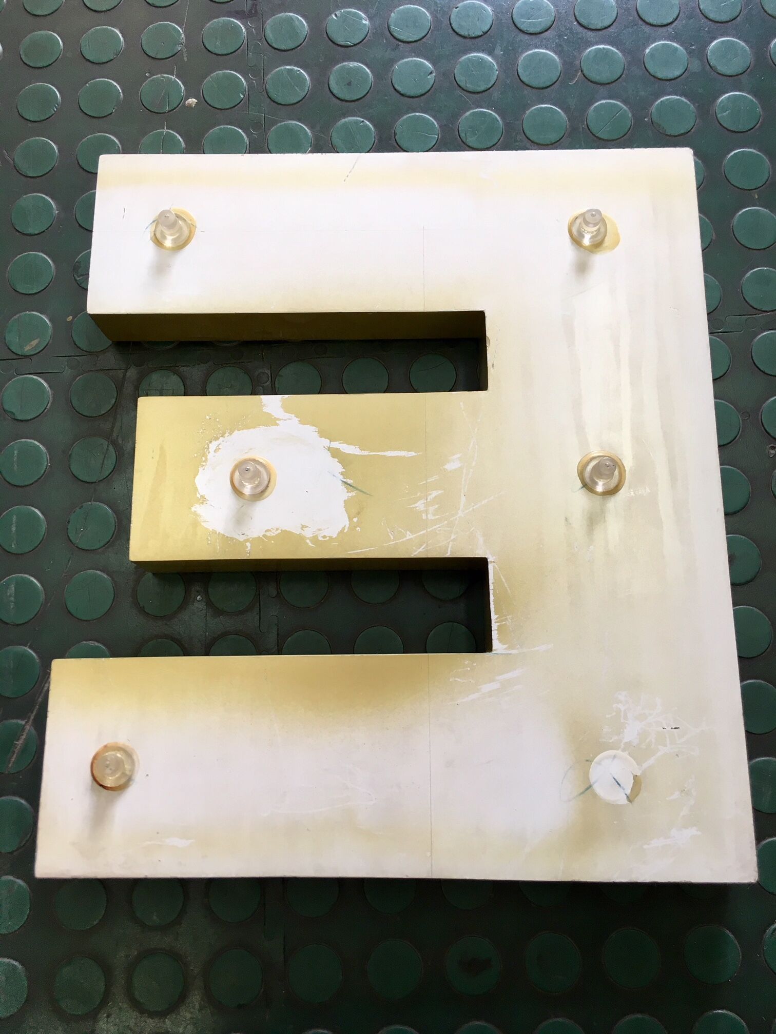 Golden sign letter E