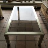 Smoked glass and brass coffee table