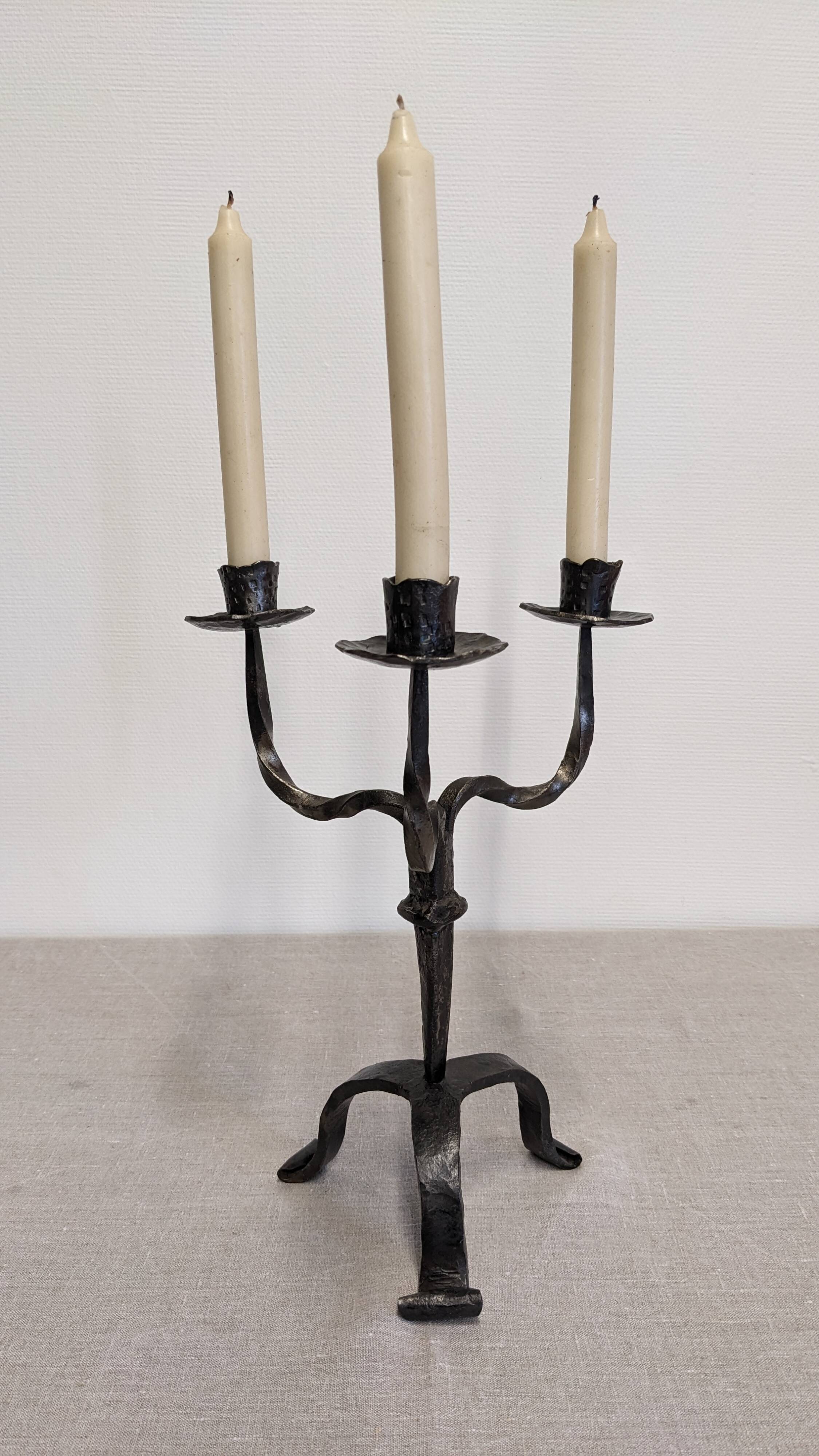 Brutalist candelabrum with 3 lights in wrought iron, France circa 1950.