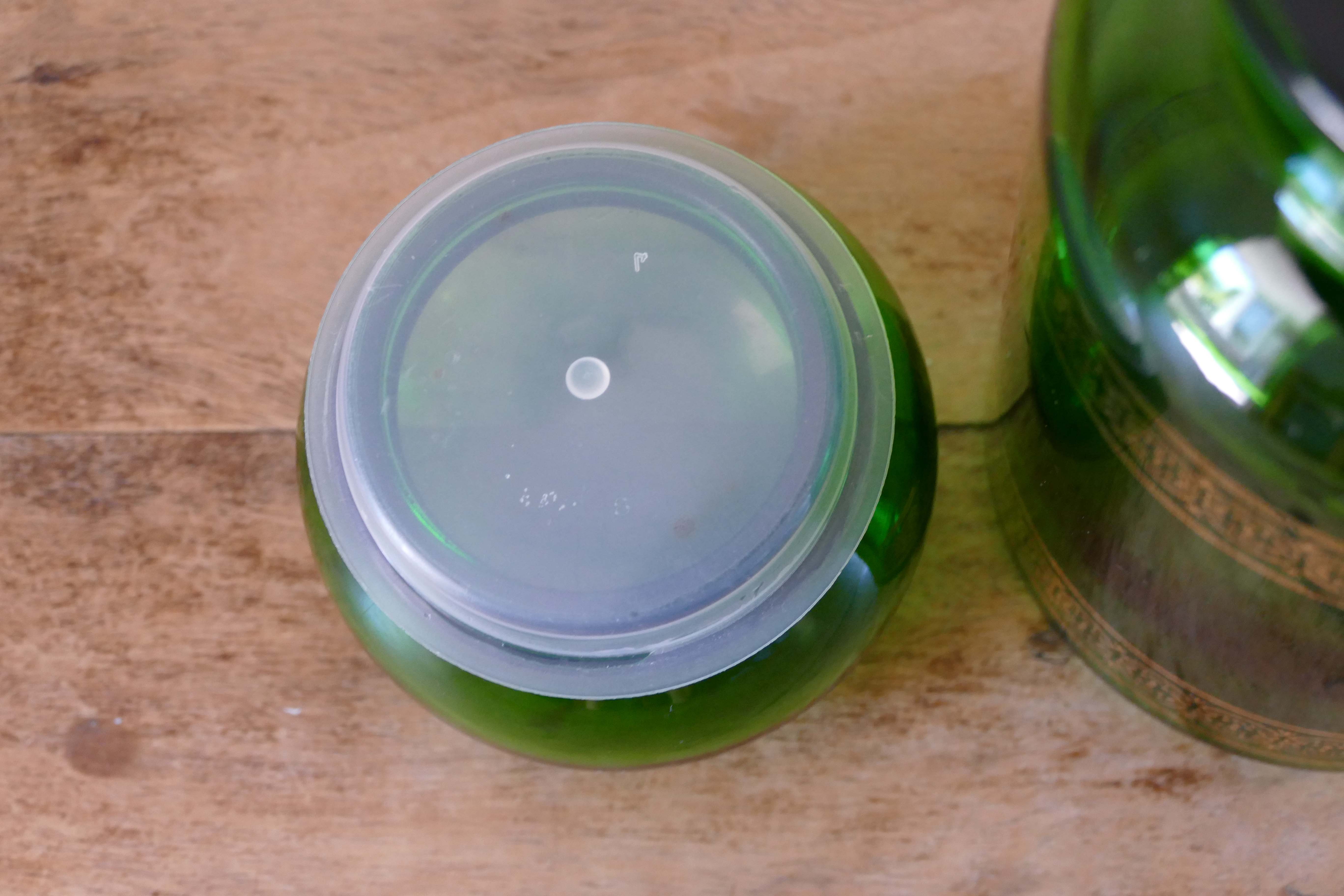 Green vintage apothecary pot and golden ledé