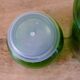 Green vintage apothecary pot and golden ledé
