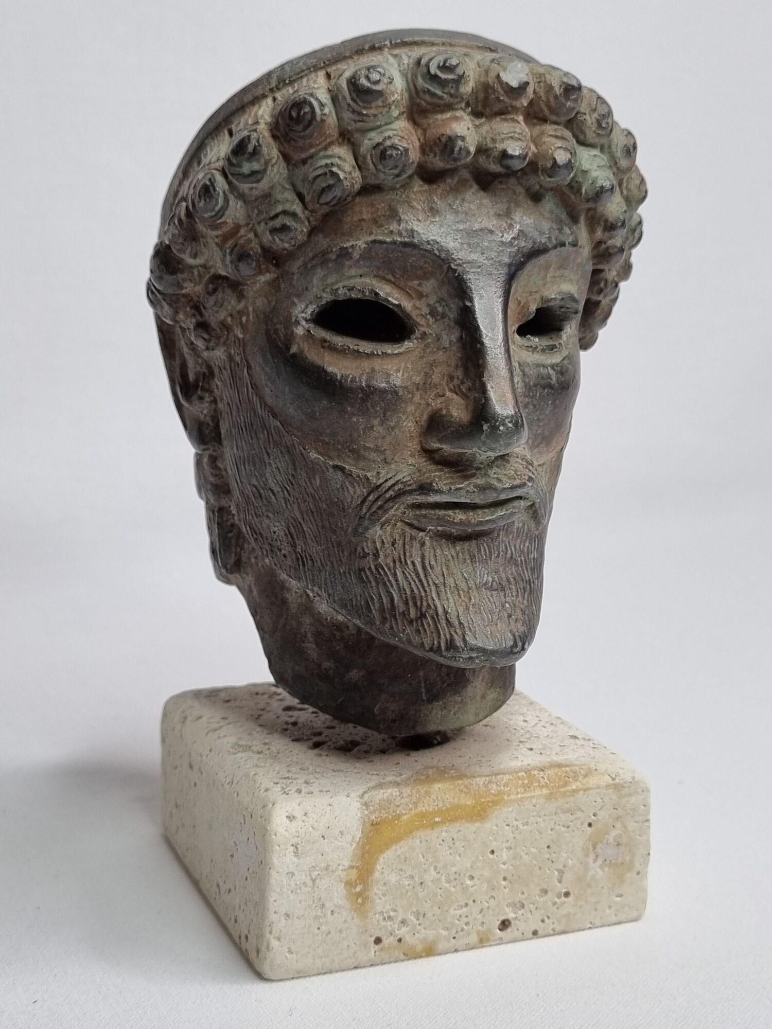 Head of Zeus in patinated plaster in imitation of bronze, 15 cm