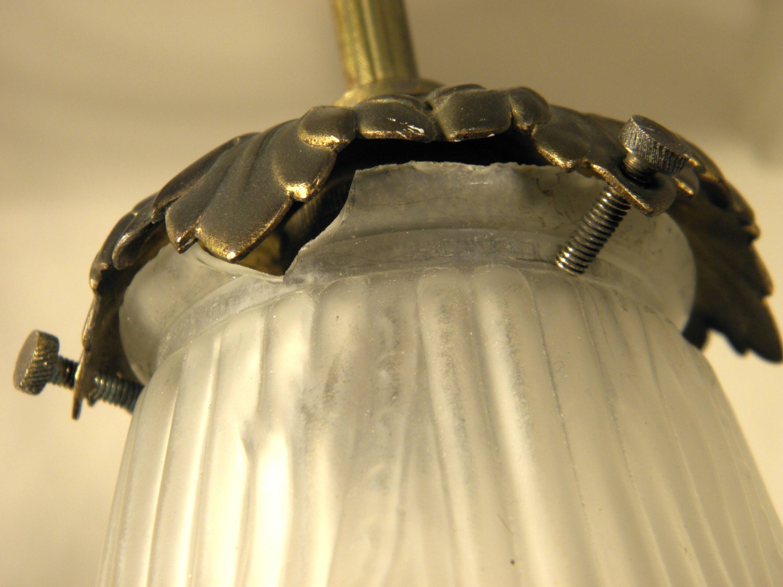 Chandelier with three brass and glass lights